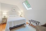 Adorable room with a double bed and a sky light 